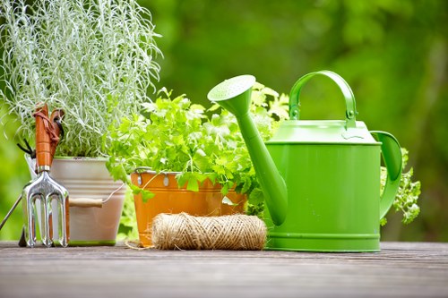 Garden maintenance crew in East Bedfont following safety procedures