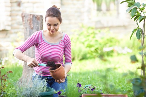 Gardener reviewing safety measures during routine maintenance work